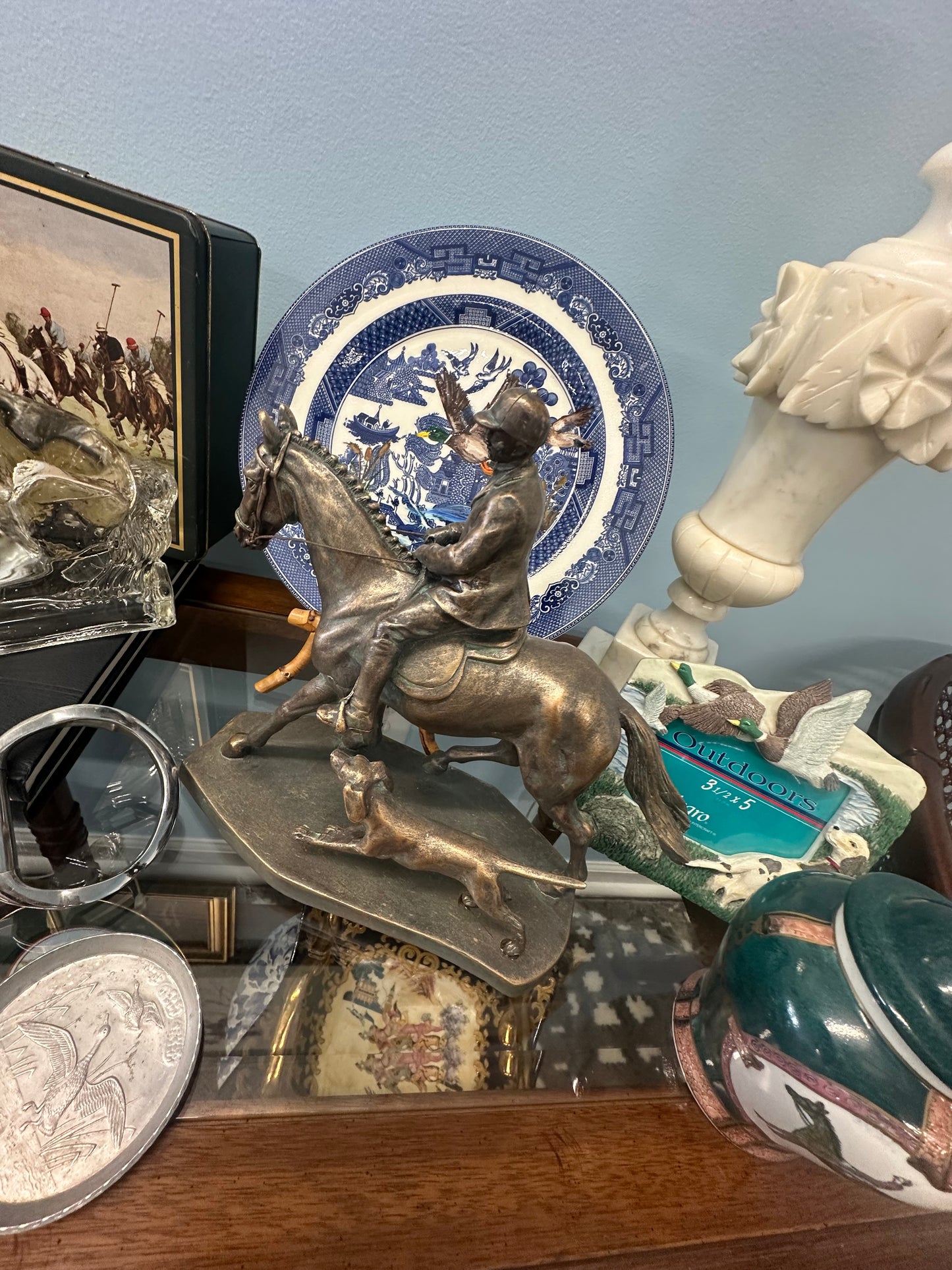 Hunt scene statue