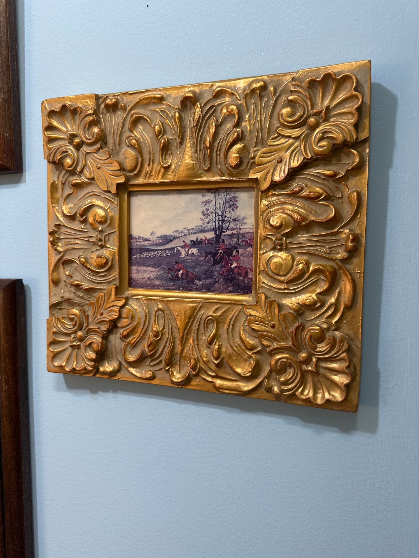 Hunt scene in gold frame