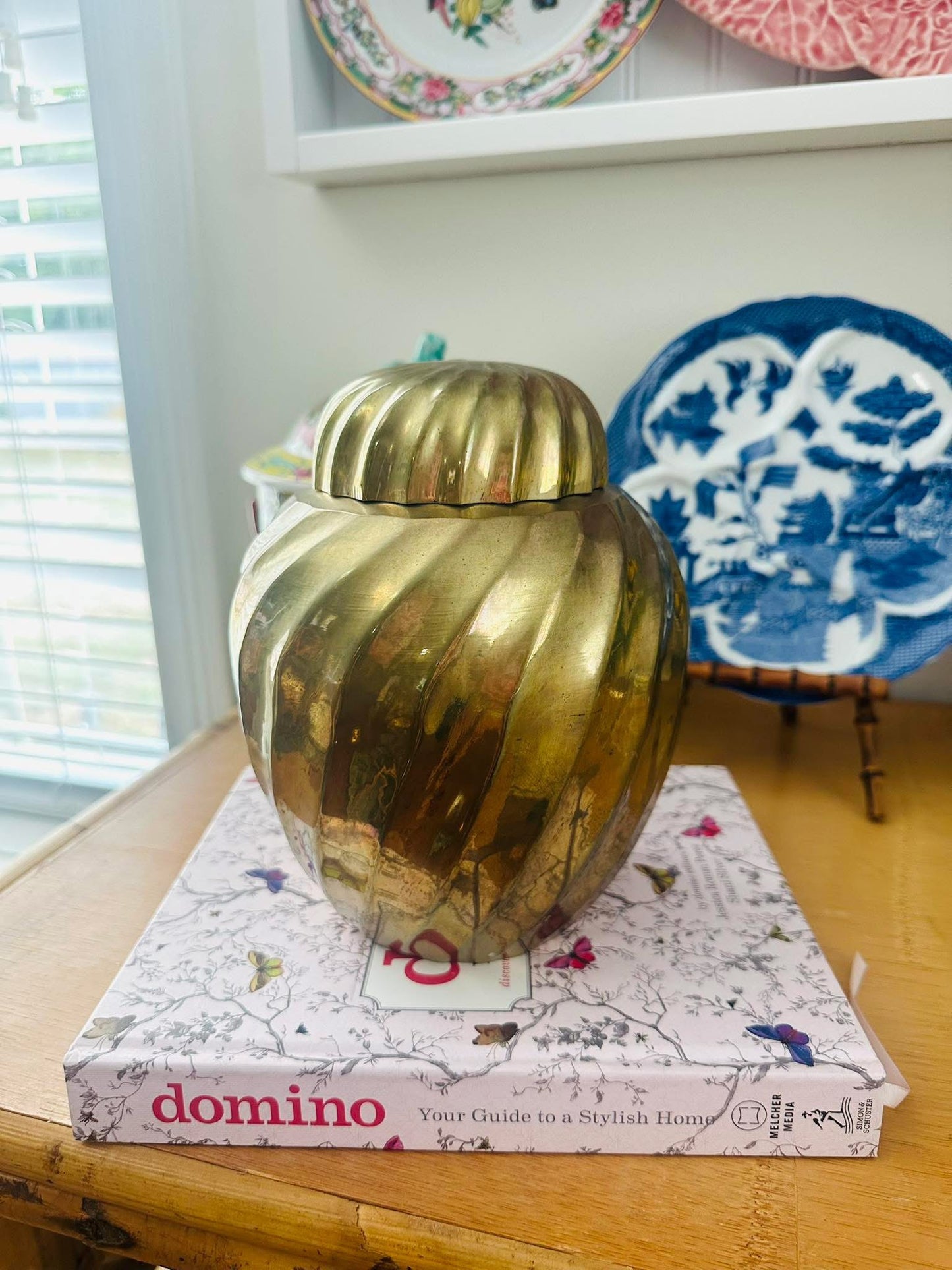 This gorgeous brass spiral lidded ginger jar. A timeless piece that adds just the right touch of elegance and charm!