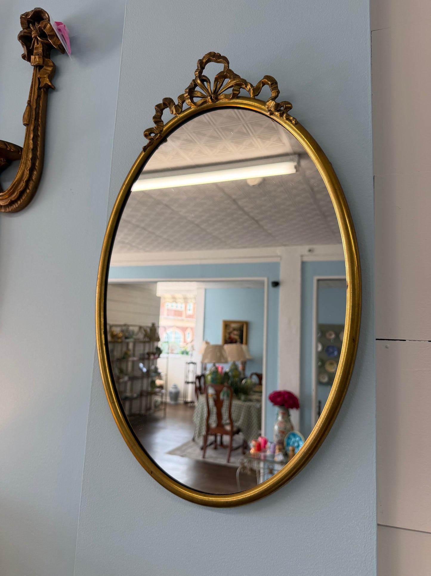 Antique bow mirror